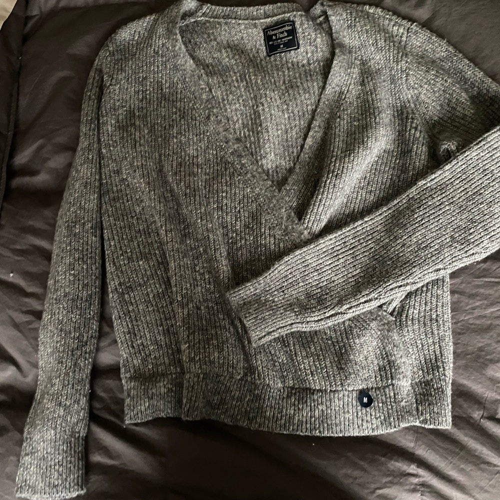 NWO tags Abercrombie and Fitch open sweater.